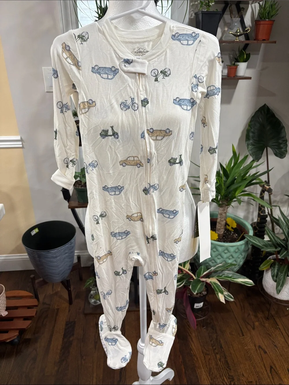 Carter’s Cream Baby Footed Zipper Onesie with Car & Bike Print size 24M